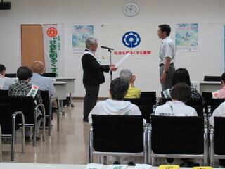 内閣総理大臣メッセージ披露の様子